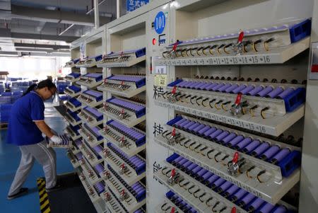 Batteries for electric vehicles are manufactured at a factory in Dongguan, China September 20, 2017. REUTERS/Bobby Yip