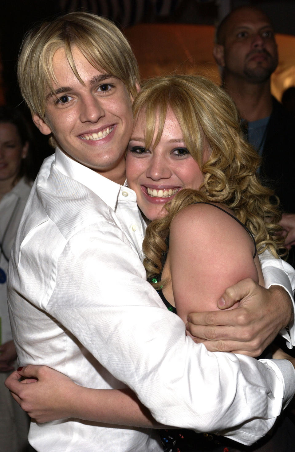 Aaron Carter hugging Hilary Duff