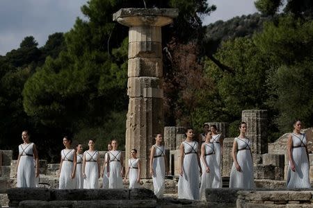 Olympics - Dress Rehearsal - Lighting Ceremony of the Olympic Flame Pyeongchang 2018 - Ancient Olympia, Olympia, Greece - October 23, 2017 Actresses during the dress rehearsal for the Olympic flame lighting ceremony for the Pyeongchang 2018 Winter Olympic Games at the site of ancient Olympia in Greece REUTERS/Alkis Konstantinidis