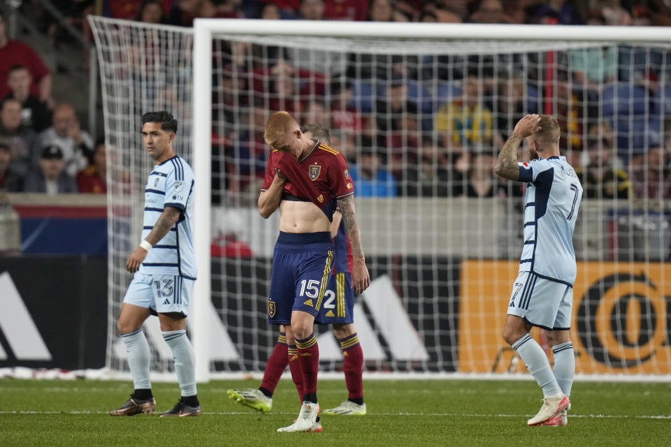 Real Salt Lake defender Justen Glad (15) leaves after receiving a red card during the first half of the team's MLS soccer match against Sporting Kansas City on Saturday, Oct. 7, 2023, in Sandy, Utah. (AP Photo/Rick Bowmer)