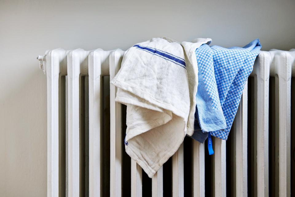 Dishtowels in simple blue-and-white patterns.