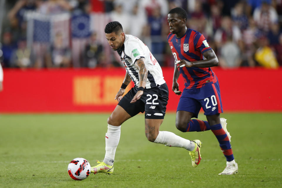 Costa Rica's Ronald Matarrita, left, controls the ball as United States' Tim Weah defends during the second half of a World Cup qualifying soccer match Wednesday, Oct. 13, 2021, in Columbus, Ohio. The United States won 2-1. (AP Photo/Jay LaPrete)