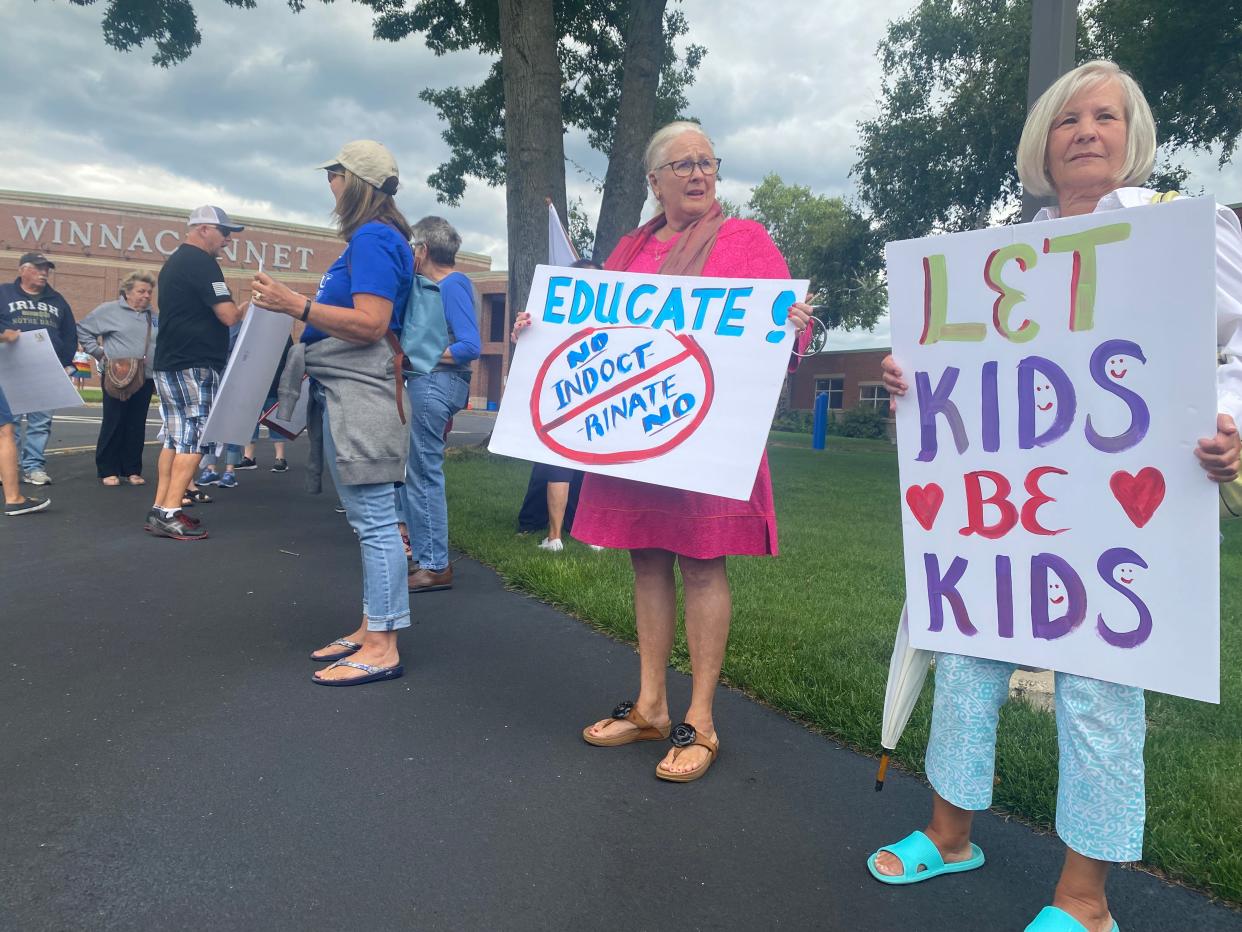 A protest was held at Winnacunnet High School Thursday in opposition to Seacoast Outright holding a teacher training at SAU 21 related to LGBTQ+ issues.