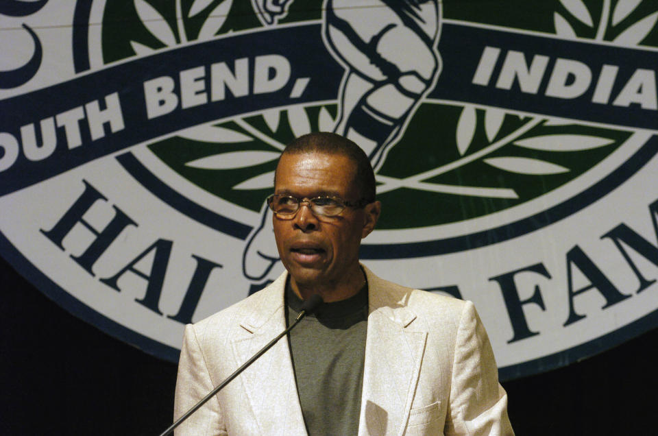 FILE - In this June 2, 2004, file photo, Gale Sayers addresses a luncheon sponsored by the College Football Hall of Fall in South Bend, Ind. Hall of Famer Gale Sayers, who made his mark as one of the NFL’s best all-purpose running backs and was later celebrated for his enduring friendship with a Chicago Bears teammate with cancer, has died. He was 77. Nicknamed “The Kansas Comet” and considered among the best open-field runners the game has ever seen, Sayers died Wednesday, Sept. 23, 2020, according to the Pro Football Hall of Fame. (AP Photo/Joe Raymond, File)