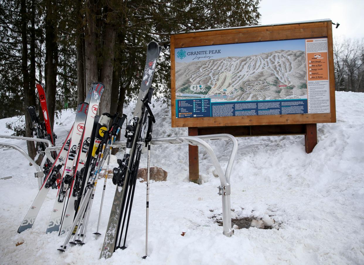 Skis are lined up next to a map of Granite Peak’s slopes and trails on Jan. 20 at Granite Peak Ski Area in Rib Mountain.