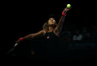 Tennis - WTA Tour Finals - Singapore Indoor Stadium, Kallang, Singapore - October 22, 2018 Japan's Naomi Osaka in action during her group stage match against Sloane Stephens of the U.S. REUTERS/Edgar Su