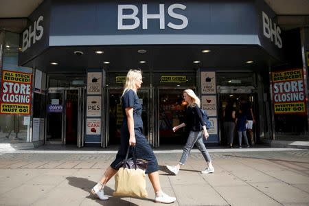 Pedestrians walk past a BHS store in London, Britain July 25, 2016. REUTERS/Neil Hall