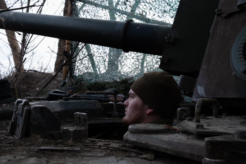 A Ukrainian artilleryman inside a M109 self-propelled howtizer at positions in Donetsk Oblast on Feb. 3, 2023. (Francis Farrell/The Kyiv Independent)