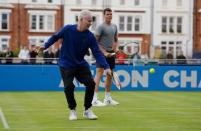 Britain Tennis - Aegon Championships - Queens Club, London - 13/6/16 John McEnroe and Canada's Milos Raonic during a practice session Action Images via Reuters / Tony O'Brien