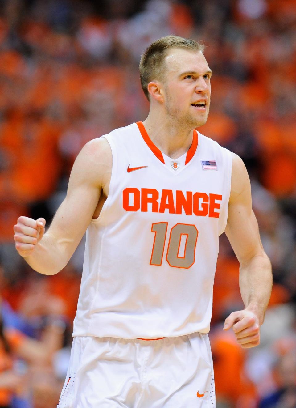 Syracuse Orange guard Trevor Cooney reacts to a made three point basket against the North Carolina Tar Heels during the second half at the Carrier Dome.