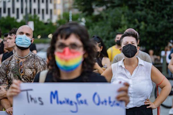 PHOTO: People protest during a rally calling for more government action to combat the spread of monkeypox, on July 21, 2022 in New York City. (Jeenah Moon/Getty Images)