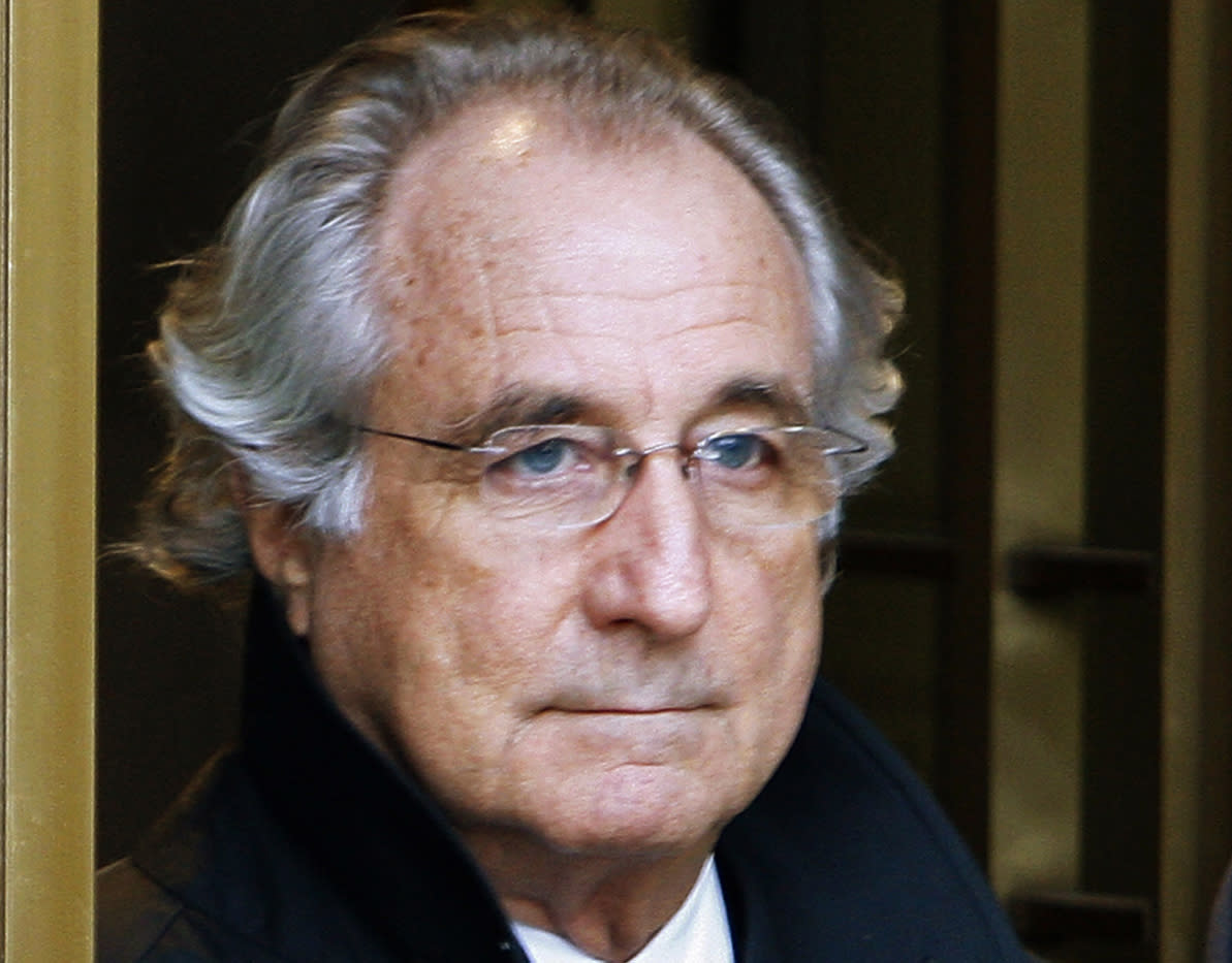 Bernard Madoff exits the Manhattan federal court house in New York in this January 14, 2009 file photo.   REUTERS/Brendan McDermid/File Photo
