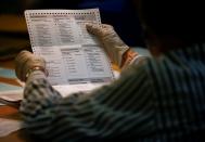 FILE PHOTO: FILE PHOTO: Operations at the Thurston County Ballot Processing Center in Tumwater