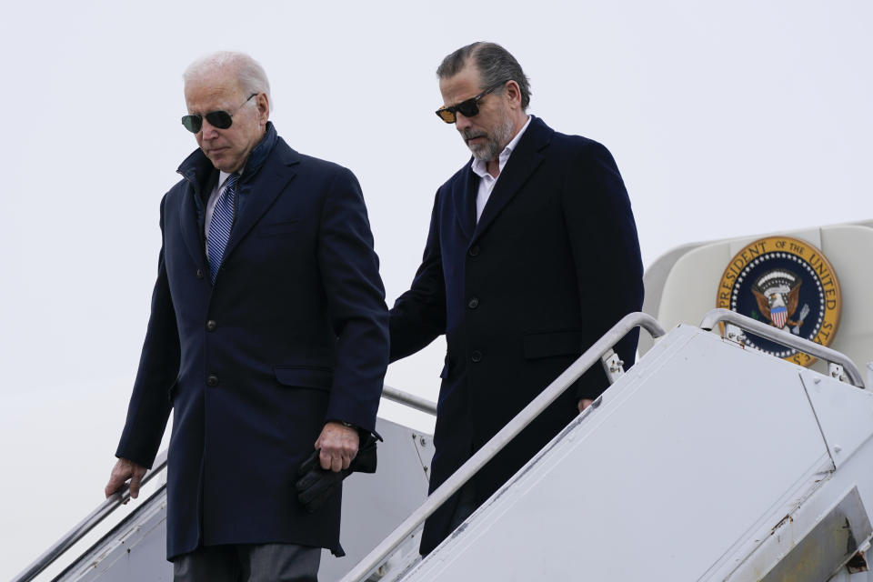 President Biden and Hunter Biden step off Air Force One last year.