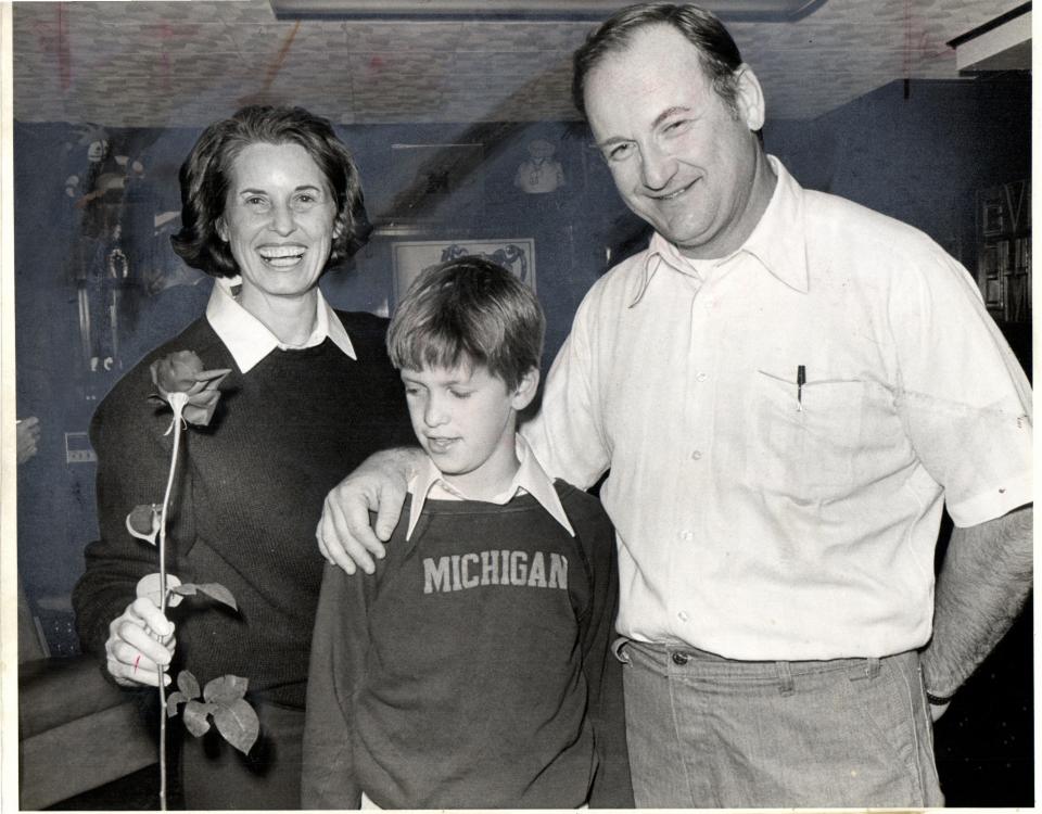 Glenn Edward "Bo" Schembechler Jr., right, Millie Schembechler, left, and Glenn Schembechler III, center.