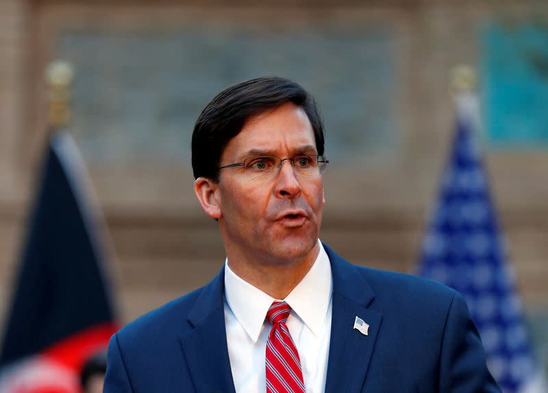 FILE PHOTO: U.S. Defense Secretary Mark Esper, speaks during a joint news conference with Afghanistan's President Ashraf Ghani, and NATO Secretary General Jens Stoltenberg,(unseen) in Kabul