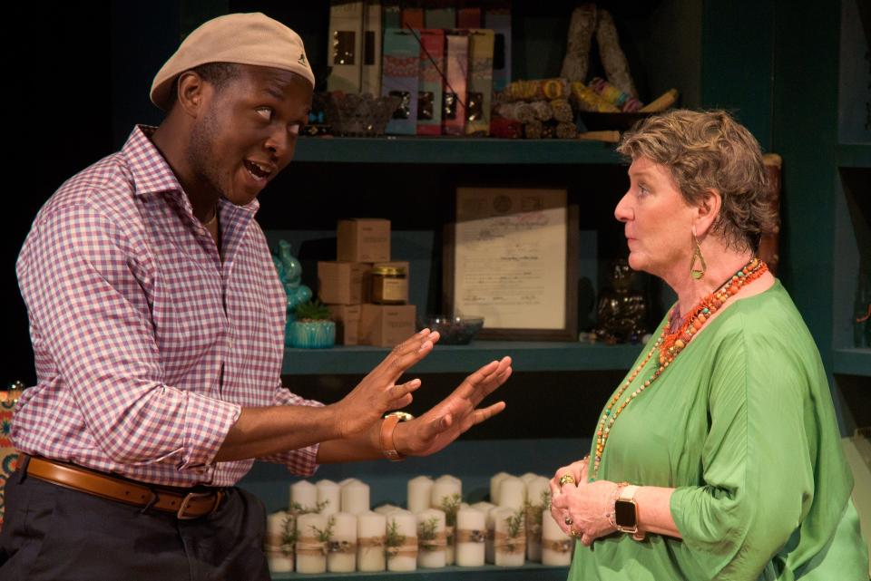 London Carlisle, left, plays a documentary filmmaker, and Kim Crow plays a woman finally admitting some long-ago misdeeds in the world premiere of Bruce Graham’s “Visit Joe Whitefeather (and bring the kids!)” at Florida Studio Theatre.