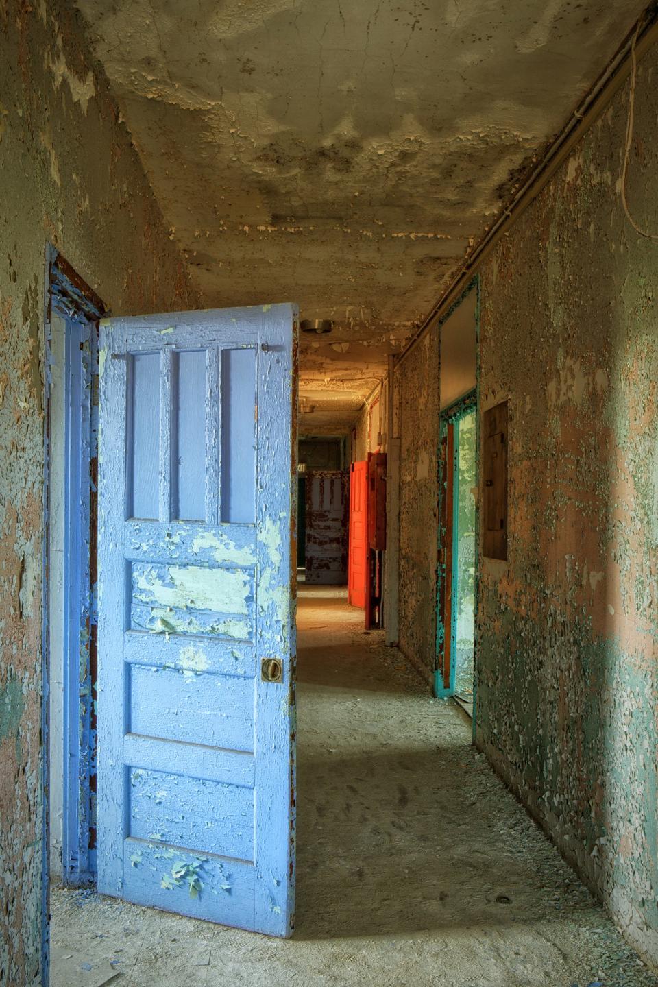 Franklin photographer Rebecca Skinner photographs abandoned spaces throughout the United States. She says, "Texture, color and light play an important part in my image making and I am attracted to the beauty of these places as well as the forgotten history." 
See here is her photograph "West Hallway," photograph printed on aluminum.