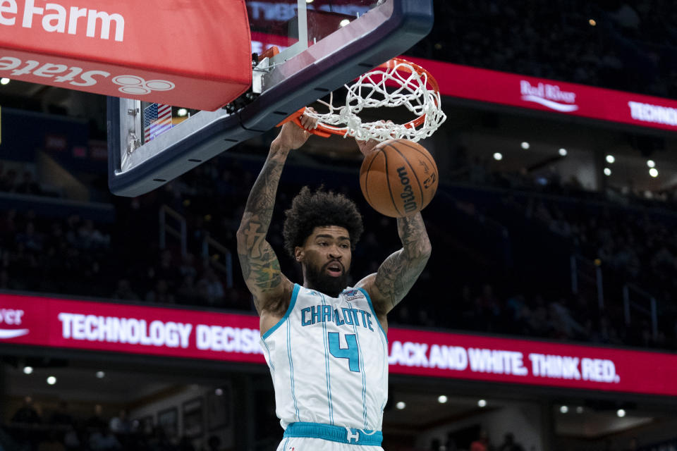 Charlotte Hornets center Nick Richards dunks during the first half of an NBA basketball game against the Washington Wizards, Friday, Nov. 10, 2023, in Washington. (AP Photo/Stephanie Scarbrough)