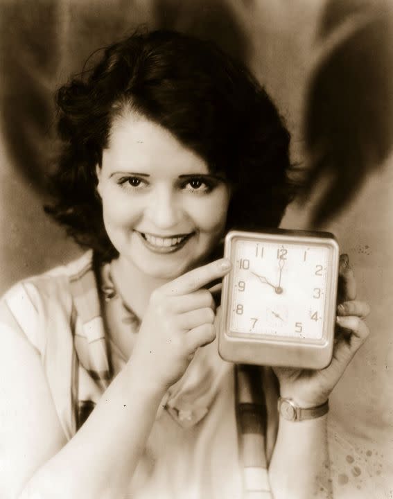 circa 1930: American actress Clara Bow, the ‘It’ girl, believes that a ten o’clock curfew will prolong youth and beauty. (Photo by Hulton Archive/Getty Images)