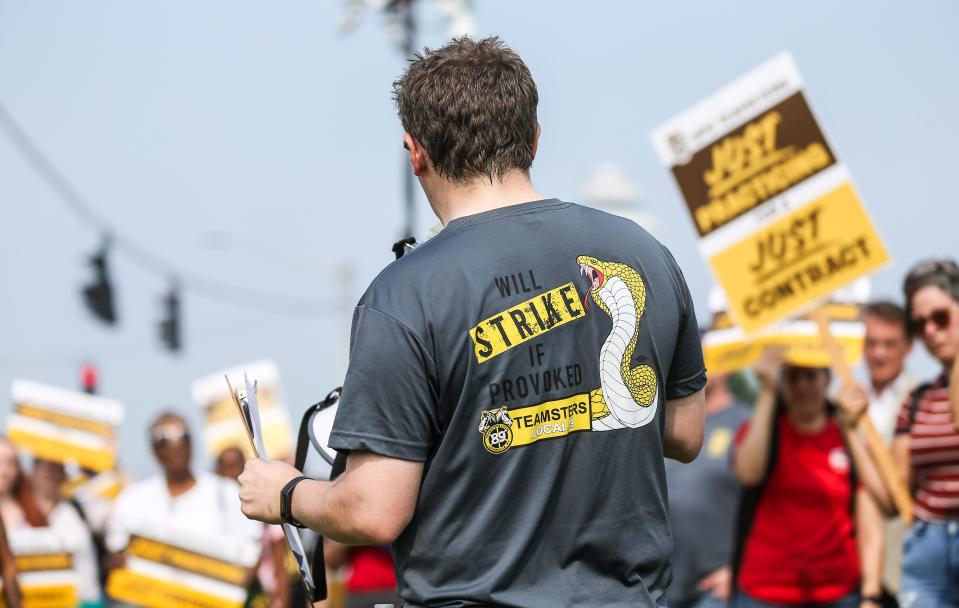 Stephen Piercey, communications director for Teamsters Local 89, helps lead a practice strike outside the UPS Worldport facility Wednesday morning in Louisville, Ky.