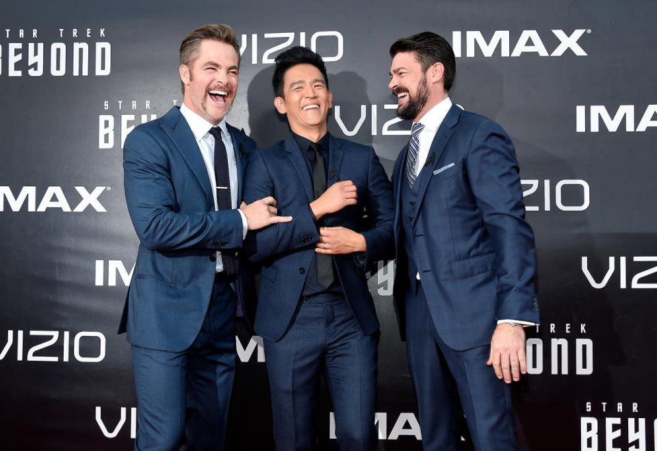 <p>The trio share a laugh at the premiere. <i>(Photo: Frazer Harrison/Getty Images)</i></p>