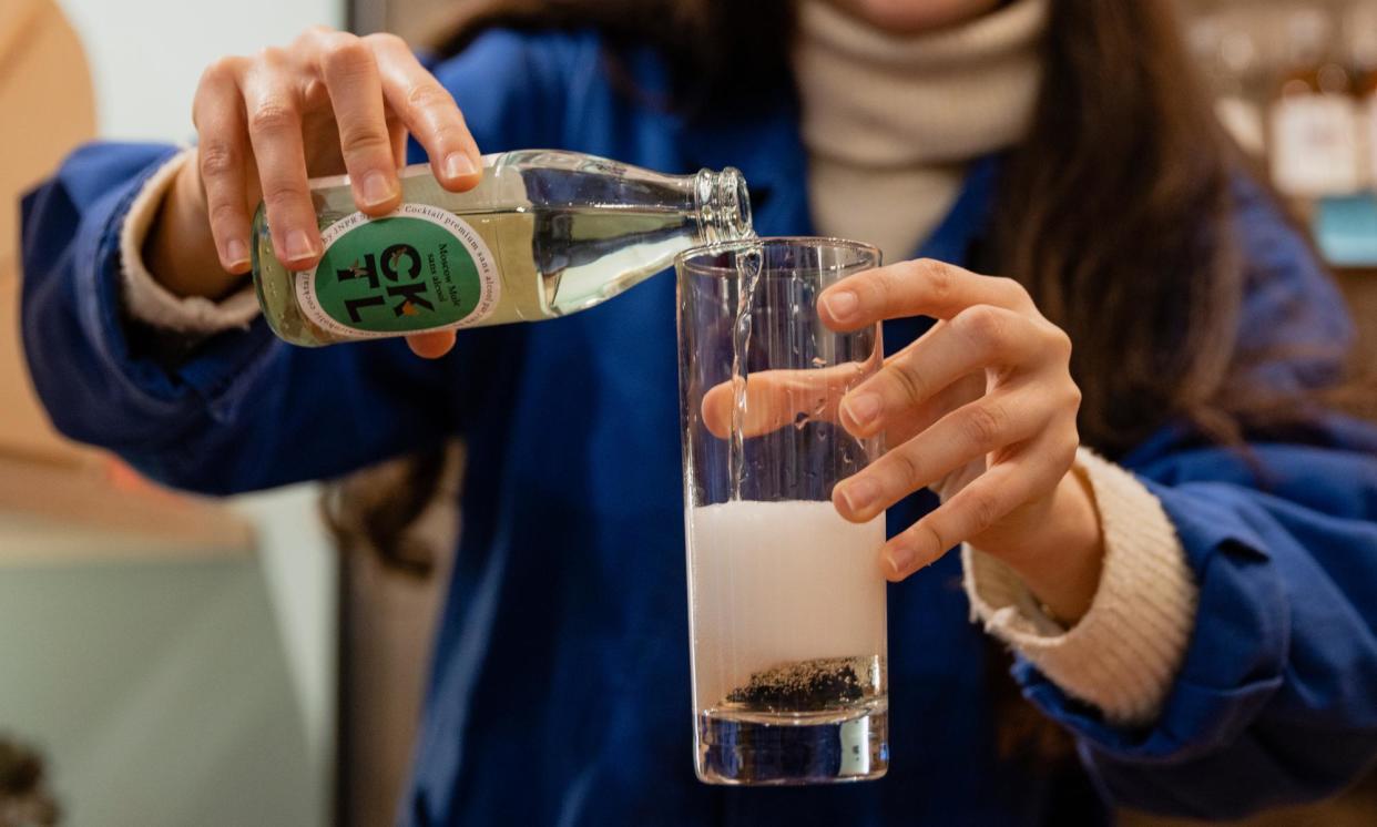 <span>This is someone tasting non-alcoholic wine in France, but how many words do the British have for getting drunk?</span><span>Photograph: Laura Stevens/The Guardian</span>