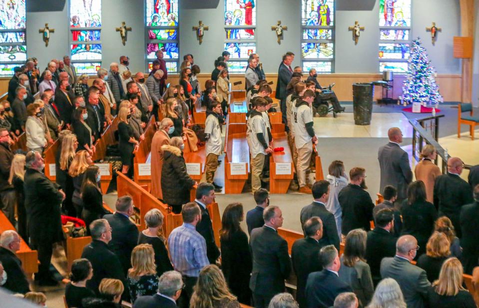 Attendees at Gerald Habershaw's Mass of Christian Burial at St. Kevin Church in Warwick on Saturday.