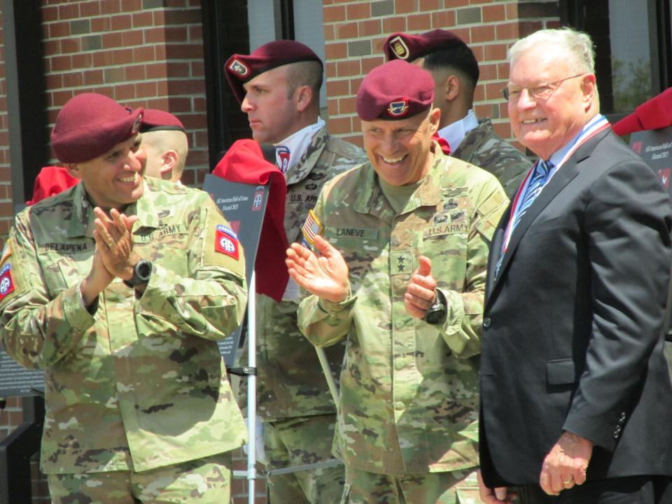 Retired  Lt. Gen. Keith Kellog Jr., far right, is congratulated by  Maj. Gen. Christopher LaNeve, second from right, and Command Sgt. Maj. Randolph Delapena, after being inducted into the 82nd Airborne Division Hall of Fame during a ceremony Wednesday, May 24, 2023, at Fort Bragg.