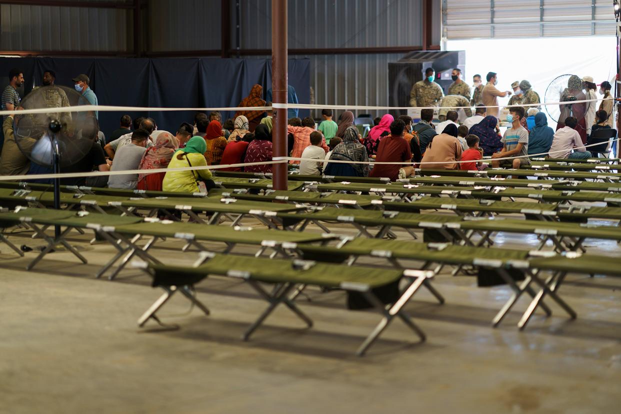 Afghan refugees are processed at Fort Bliss where they are being housed, in New Mexico, Friday, Sept. 10, 2021.