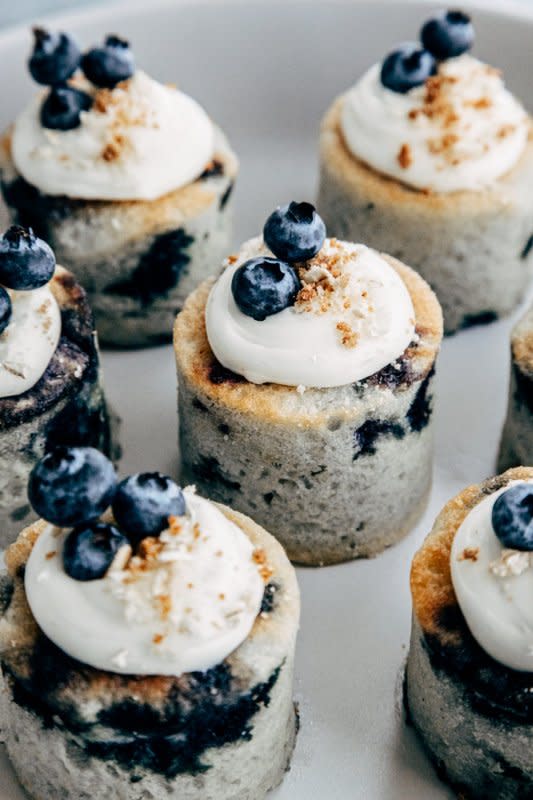 <p>Emily Laurae</p><p>These blueberry muffin petit fours are baked in a silicone mold, inverted and topped with cream cheese frosting.</p><p><strong>Get the recipe: <a href="https://emilylaurae.com/blueberry-muffin-petit-fours/" rel="nofollow noopener" target="_blank" data-ylk="slk:Blueberry Muffin Petit Fours;elm:context_link;itc:0;sec:content-canvas" class="link rapid-noclick-resp">Blueberry Muffin Petit Fours</a></strong></p>