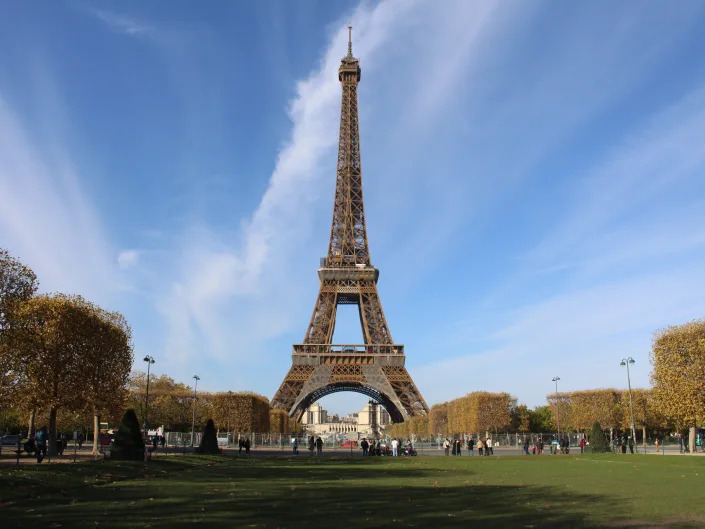 The author visited the Eiffel Tower before stopping by the American shop.