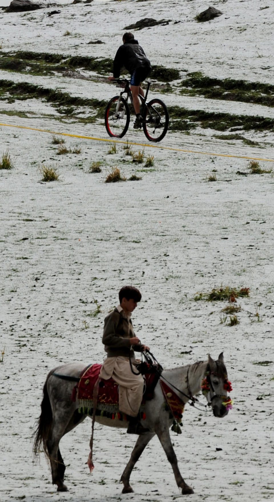 A cyclist competes during the third and last stage of the Himalayas 2011 International Mountainbike Race in the mountainous Shogran area of Pakistan's tourist region of Naran in Khyber Pakhtunkhwa province on September 18, 2011. Slovakia's Martin Haring won the Himalayas 2011 race. AFP PHOTO / AAMIR QURESHI (Photo credit should read AAMIR QURESHI/AFP/Getty Images)