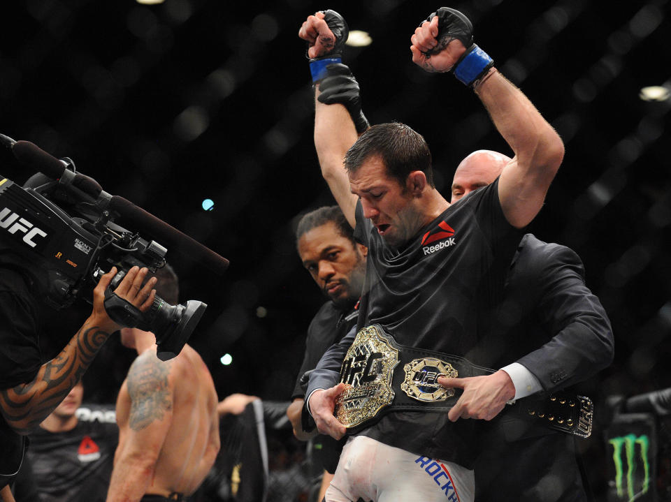 December 12, 2015; Las Vegas, NV, USA; Luke Rockhold is declared the winner and wins the championship against Chris Weidman during UFC 194 at MGM Grand Garden Arena. Mandatory Credit: Gary A. Vasquez-USA TODAY Sports 