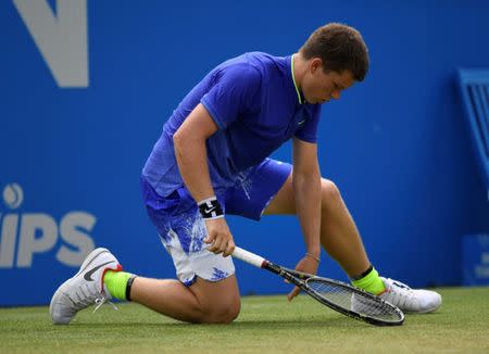 Tennis - Aegon Championships - Queen’s Club, London, Britain - June 22, 2017 USA's Stefan Kozlov falls during his second round match against Croatia's Marin Cilic Action Images via Reuters/Tony O'Brien