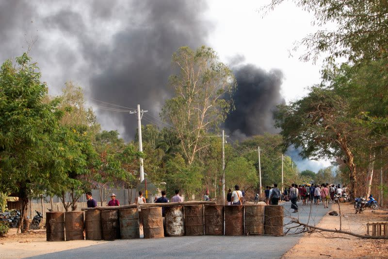 Demonstrators are seen before a clash with security forces in Taze, Myanmar