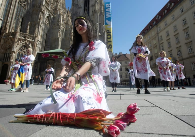 Ukrainian demonstrators protest in Vienna in April 2022 against rapes of Ukrainian women by Russian soldiers (Alex HALADA)