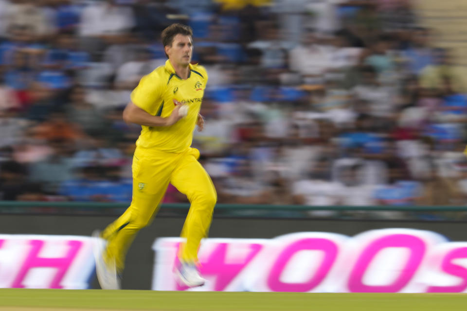 Australia's captain Pat Cummins prepares to bowls a delivery during the first one day international match between Australia and India in Mohali, India, Friday, Sept. 22, 2023. (AP Photo/Altaf Qadri)
