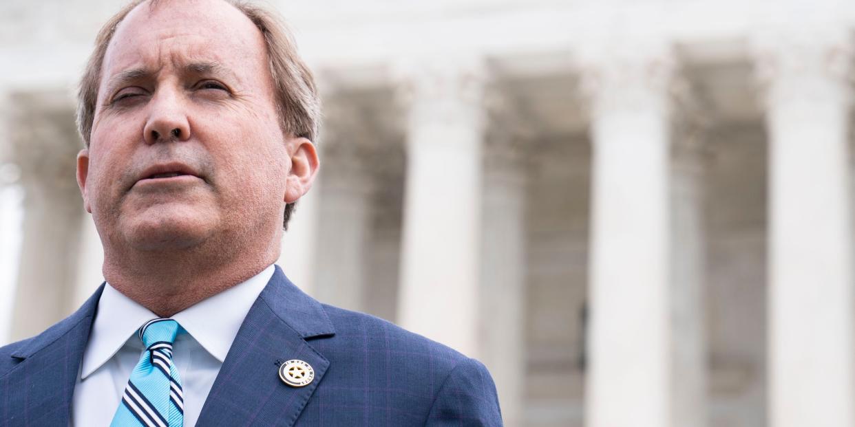 WASHINGTON, DC - ARPIL 26: Texas Attorney General Ken Paxton speaks to reporters after the Supreme Court oral arguments in the Biden v. Texas case at the Supreme Court on Capitol Hill on Tuesday, April 26, 2022 in Washington, DC. (Photo by Sarah Silbiger for The Washington Post via Getty Images)