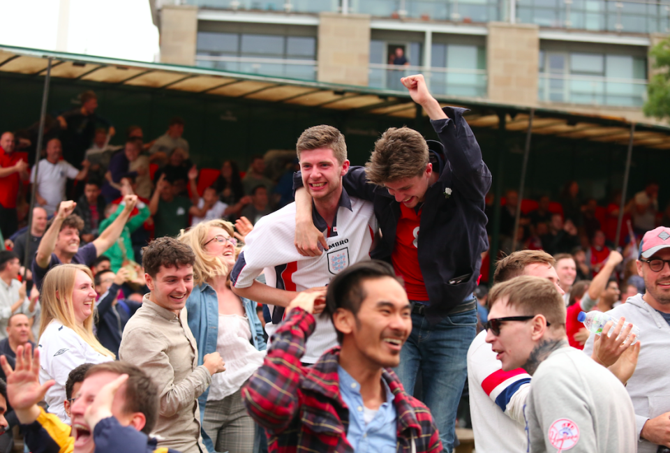 England fans celebrate opening victory