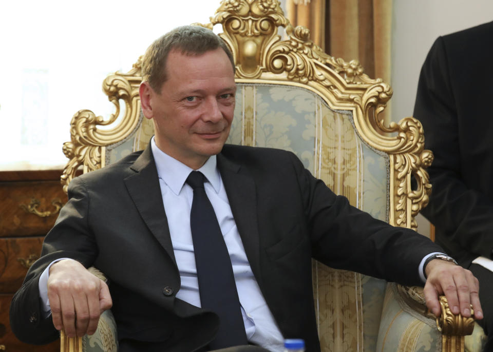 French presidential envoy Emmanuel Bonne sits in a meeting with Secretary of Iran's Supreme National Security Council Ali Shamkhani in Tehran, Iran, Wednesday, July 10, 2019. (AP Photo/Vahid Salemi)