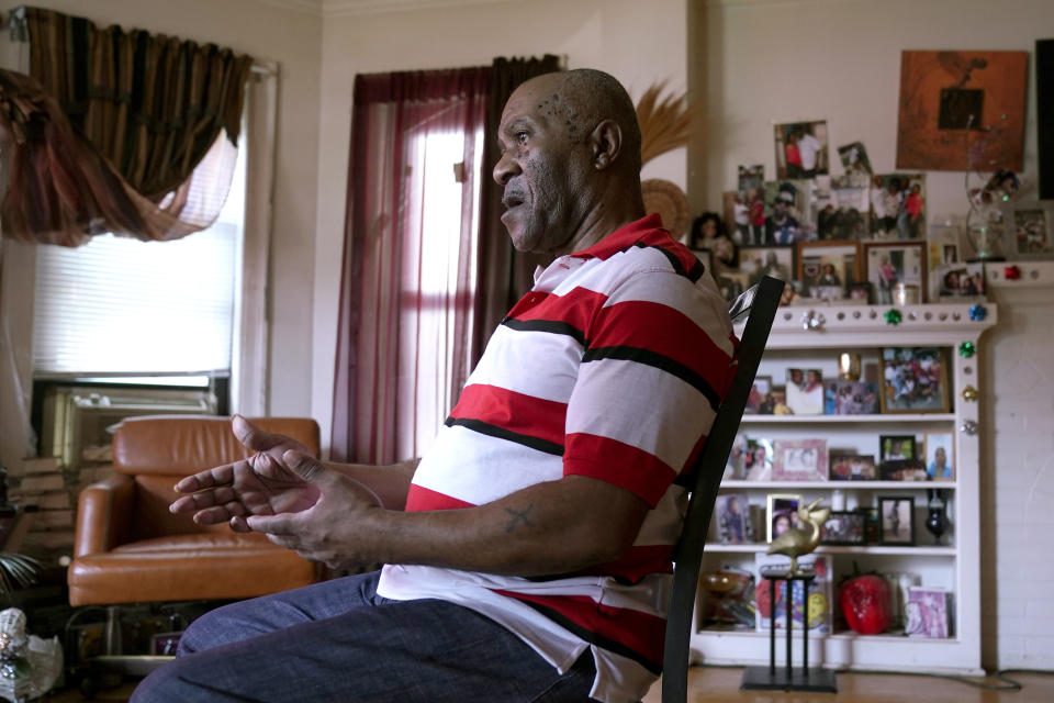 FILE - Michael Williams sits for an interview in his South Side Chicago home Tuesday, July 27, 2021. A ShotSpotter operations document, which the company had argued in court for more than a year was a trade secret, was released in late 2022 in a Chicago court case, in which police and prosecutors used ShotSpotter data as evidence in charging Williams, a Chicago grandfather with murder in 2020 for allegedly shooting a man inside his car. He spent nearly a year in jail before a judge dismissed the case on grounds of insufficient evidence. (AP Photo/Charles Rex Arbogast, File)