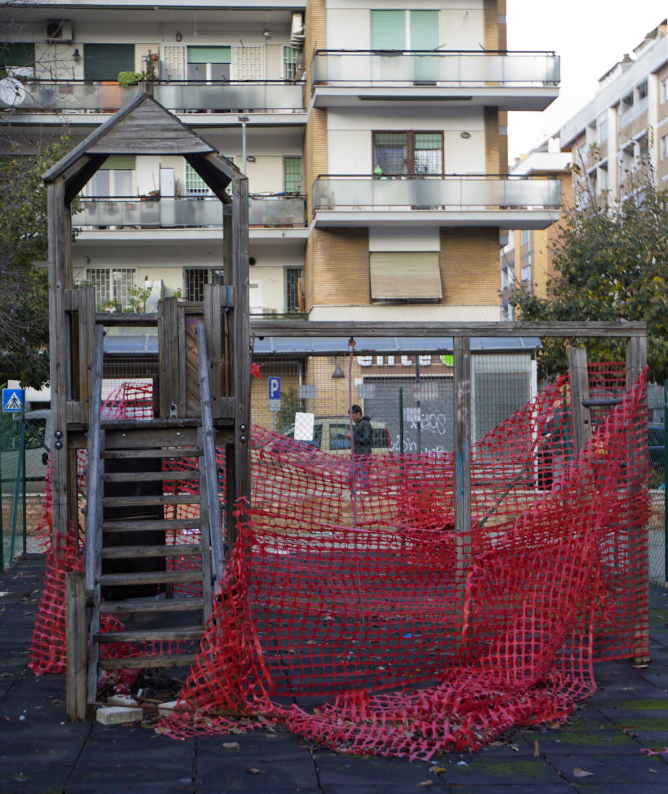 Recreational equipment is sealed off in a playground in Rome, Thursday, Nov. 8, 2018. Rome’s monumental problems of garbage and decay exist side-by-side with Eternal City’s glories. (AP Photo/Alessandra Tarantino)