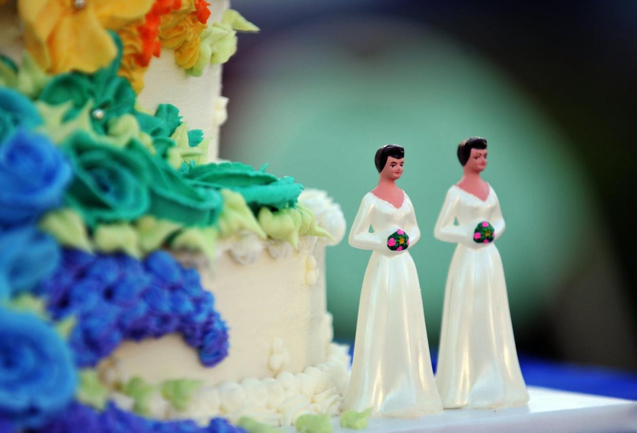 <span class="caption">Since there’s no romantic relationship, judges are likely to default to ruling that platonic marriages are an attempt to game the system.</span> <span class="attribution"><a class="link " href="https://www.gettyimages.com/detail/news-photo/wedding-cake-with-statuettes-of-two-women-is-seen-during-news-photo/81102220?adppopup=true" rel="nofollow noopener" target="_blank" data-ylk="slk:Gabriel Bouys/AFP via Getty Images;elm:context_link;itc:0;sec:content-canvas">Gabriel Bouys/AFP via Getty Images</a></span>