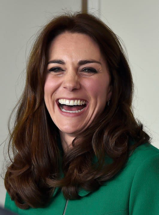 FILE – Britain’s Kate, the Duchess of Cambridge, laughs, during a visit to St Thomas’ Hospital with Prince William to promote mental health issuses, in London, Thursday March 10, 2016. (Toby Melville /Pool Photo via AP, File)