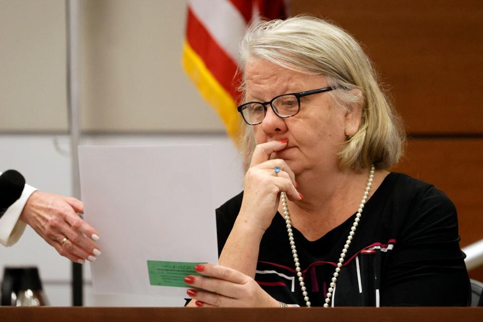 Assistant Public Defender Melisa McNeill shows a photograph to Anne Marie Fischer, former director of Young Minds Learning Center, the preschool attended by Marjory Stoneman Douglas High School shooter Nikolas Cruz, as she questions Fischer during the penalty phase of Cruz’s trial at the Broward County Courthouse in Fort Lauderdale on Tuesday, August 23, 2022. Cruz previously plead guilty to all 17 counts of premeditated murder and 17 counts of attempted murder in the 2018 shootings.