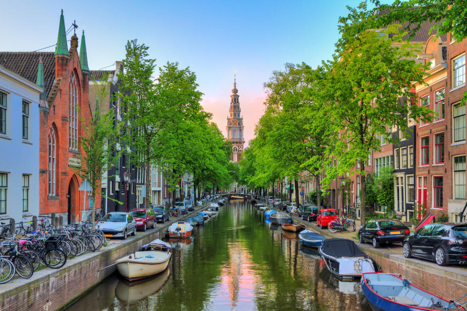 <div><p>"Amsterdam is a city made for kids. Great museums (especially the <a href="https://go.redirectingat.com?id=74679X1524629&sref=https%3A%2F%2Fwww.buzzfeed.com%2Flaurafrustaci%2Ffamily-vacation-ideas&url=https%3A%2F%2Fwww.tripadvisor.com%2FAttraction_Review-g188590-d194316-Reviews-Het_Scheepvaartmuseum_The_National_Maritime_Museum-Amsterdam_North_Holland_Provinc.html&xcust=6269937%7CBF-VERIZON&xs=1" rel="nofollow noopener" target="_blank" data-ylk="slk:National Maritime Museum;elm:context_link;itc:0;sec:content-canvas" class="link ">National Maritime Museum</a>), easy to get around, locals are kid-friendly, food is good, English is widely spoken, and a lovely countryside outside of the city waiting to be explored." </p><p>—<a href="https://www.buzzfeed.com/b47259a7e0" rel="nofollow noopener" target="_blank" data-ylk="slk:b47259a7e0;elm:context_link;itc:0;sec:content-canvas" class="link ">b47259a7e0</a></p><p>You can also find greenery in the middle of the city at the <a href="https://go.redirectingat.com?id=74679X1524629&sref=https%3A%2F%2Fwww.buzzfeed.com%2Flaurafrustaci%2Ffamily-vacation-ideas&url=https%3A%2F%2Fwww.tripadvisor.com%2FAttraction_Review-g188590-d189384-Reviews-Vondelpark-Amsterdam_North_Holland_Province.html&xcust=6269937%7CBF-VERIZON&xs=1" rel="nofollow noopener" target="_blank" data-ylk="slk:Vondelpark;elm:context_link;itc:0;sec:content-canvas" class="link ">Vondelpark</a>, explore on bikes (you can even rent a <i>bakfiet</i>, a bicycle with a box at the front where kids can sit), visit the <a href="https://go.redirectingat.com?id=74679X1524629&sref=https%3A%2F%2Fwww.buzzfeed.com%2Flaurafrustaci%2Ffamily-vacation-ideas&url=https%3A%2F%2Fwww.tripadvisor.com%2FAttraction_Review-g188590-d244497-Reviews-ARTIS_Amsterdam_Royal_Zoo-Amsterdam_North_Holland_Province.html&xcust=6269937%7CBF-VERIZON&xs=1" rel="nofollow noopener" target="_blank" data-ylk="slk:Amsterdam Royal Zoo;elm:context_link;itc:0;sec:content-canvas" class="link ">Amsterdam Royal Zoo</a>, or — for slightly older kids — visit the <a href="https://go.redirectingat.com?id=74679X1524629&sref=https%3A%2F%2Fwww.buzzfeed.com%2Flaurafrustaci%2Ffamily-vacation-ideas&url=https%3A%2F%2Fwww.tripadvisor.com%2FAttraction_Review-g188590-d190555-Reviews-Anne_Frank_House-Amsterdam_North_Holland_Province.html&xcust=6269937%7CBF-VERIZON&xs=1" rel="nofollow noopener" target="_blank" data-ylk="slk:Anne Frank House;elm:context_link;itc:0;sec:content-canvas" class="link ">Anne Frank House</a>.</p></div><span> Dennisvdw / Getty Images</span>