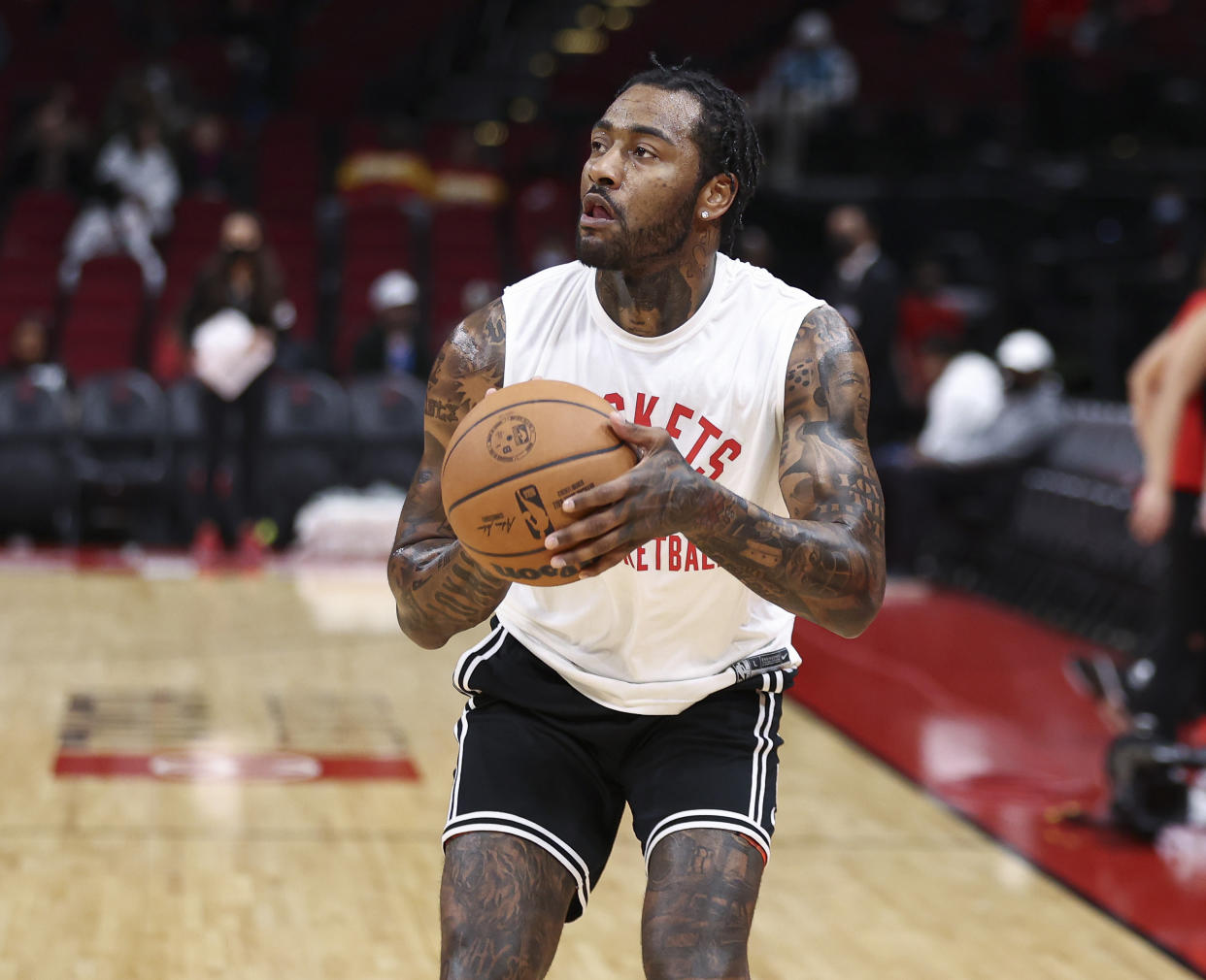 Nov 27, 2021; Houston, Texas, USA; Houston Rockets guard John Wall (1) warms up before the game against the Charlotte Hornets at Toyota Center. Mandatory Credit: Troy Taormina-USA TODAY Sports