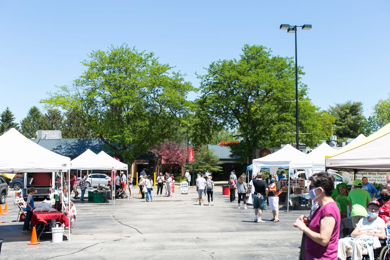 Customers and vendors participate in the Edgebrook Farmers Market at Edgebrook shopping plaza Wednesday, May 26, 2021, in Rockford. Edgebrook Farmers Market starts for the season Wednesday, May 3.