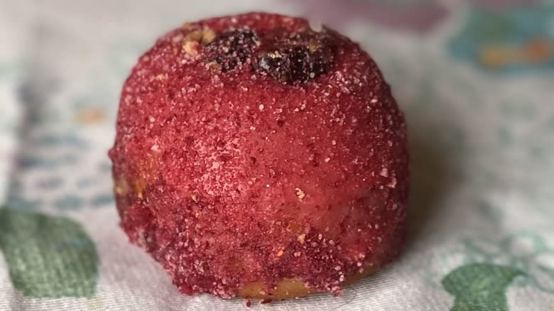 Cranberry Craze doughnut on tablecloth